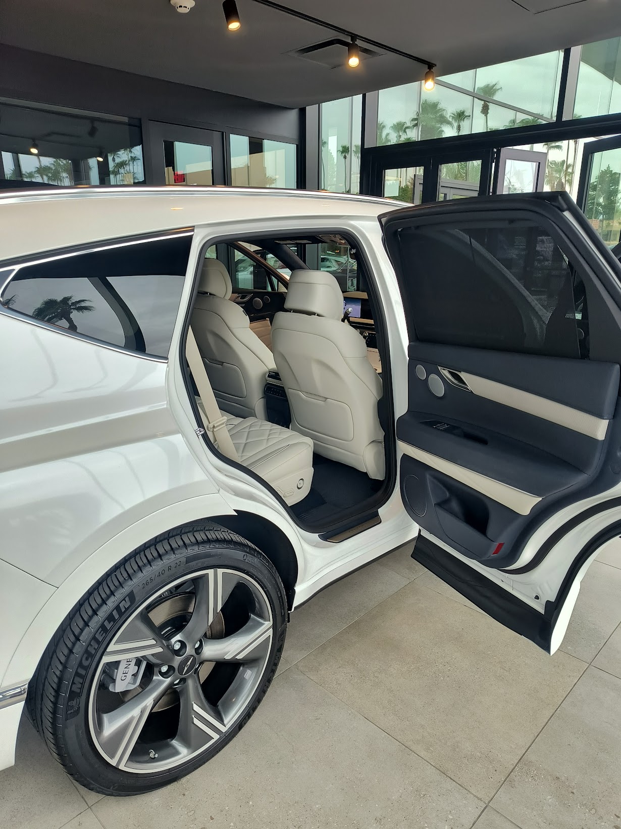 White leather rear seats in luxury SUV after interior detail