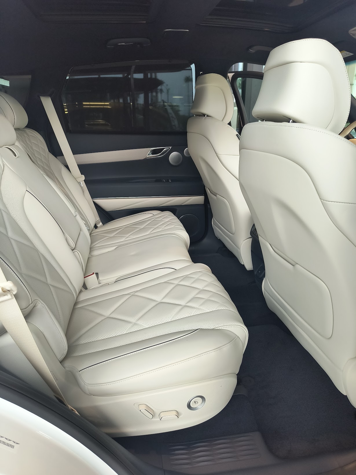 Clean cream leather rear seats after interior detail