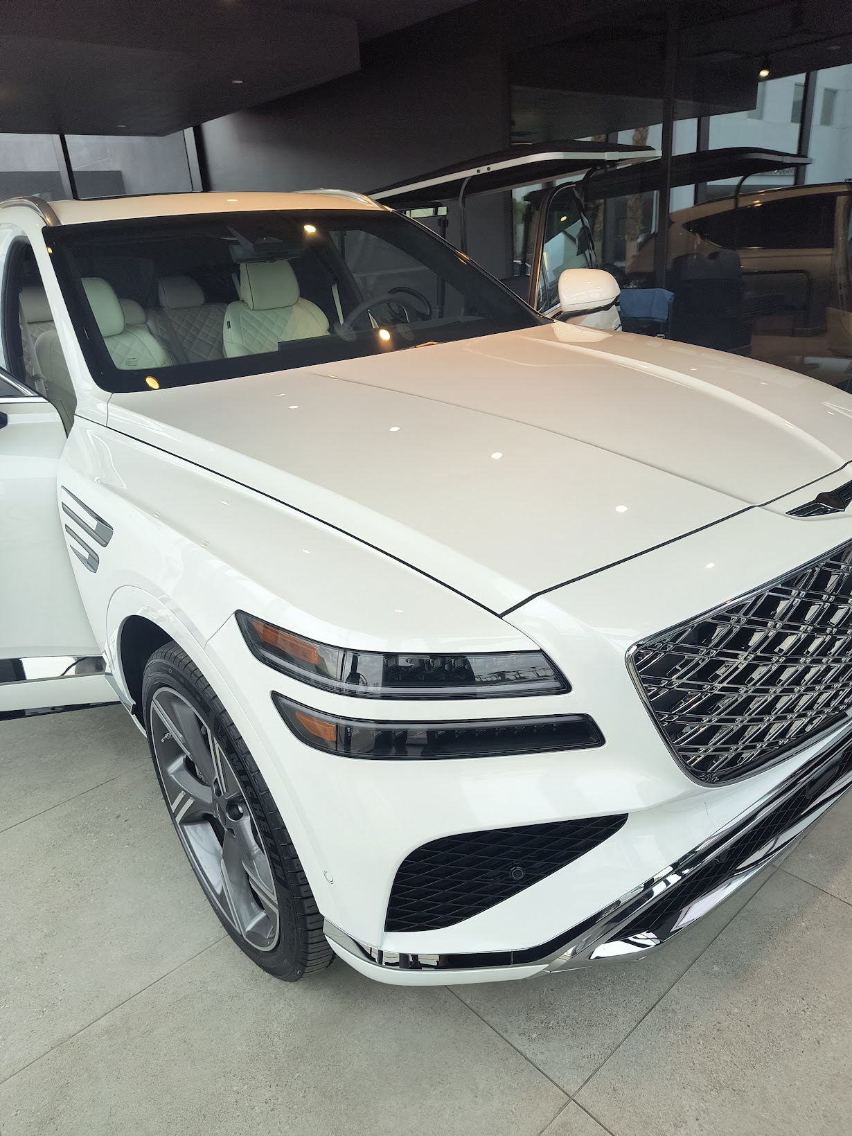 White Genesis GV80 after exterior wash