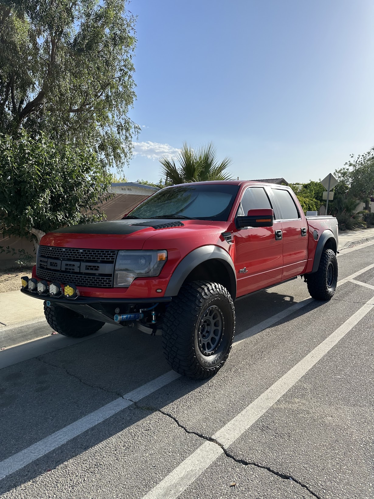 Red Ford F-150 Raptor after exterior wash